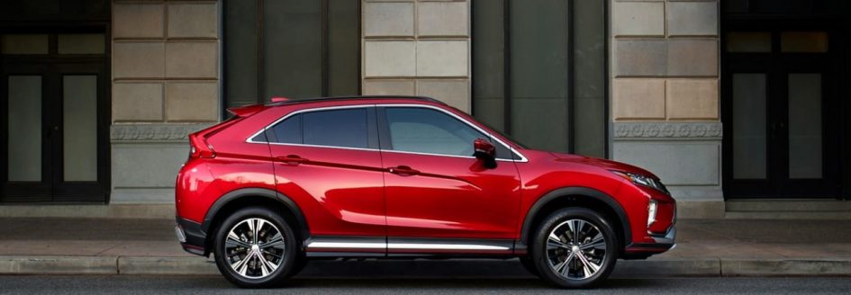 Red 2019 Mitsubishi Eclipse Cross parked curbside
